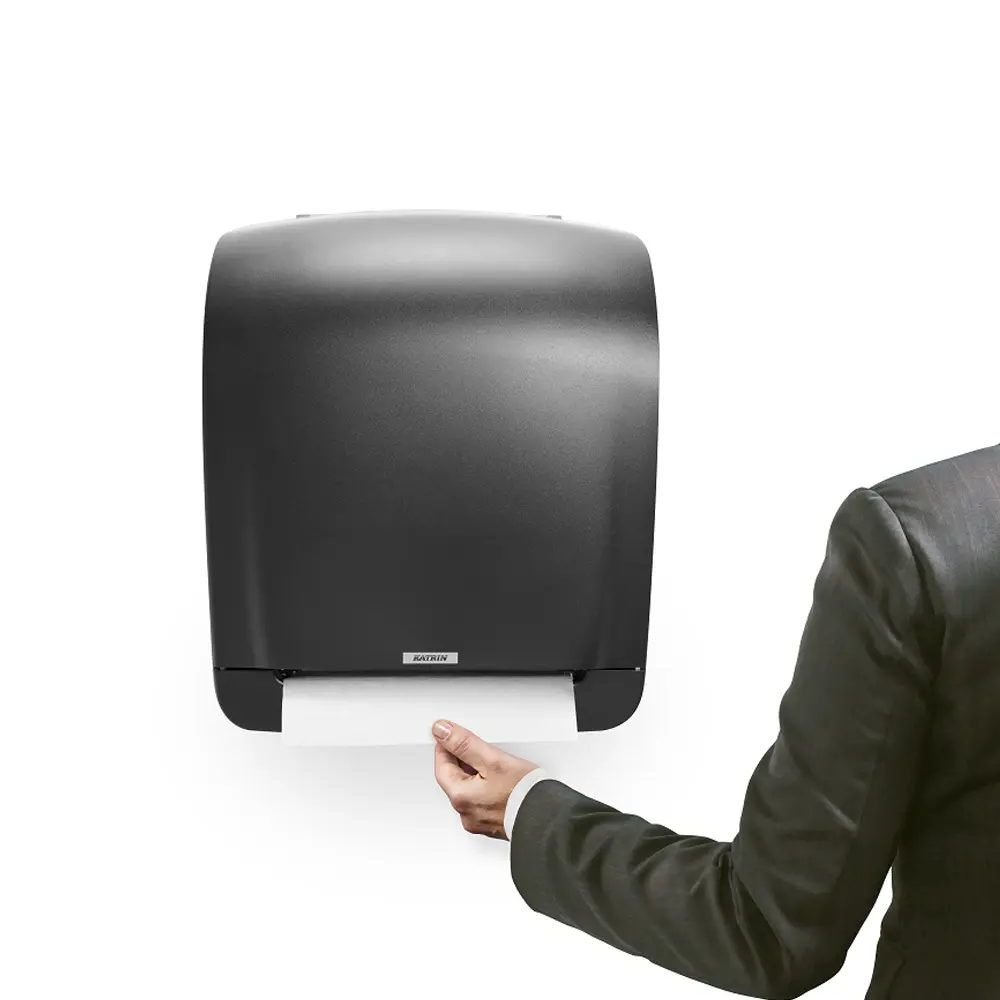 Katrin System-Handtuchrollenspender M2 aus schwarzem Kunststoff mit Schneidemechanismus für System-Handtuchrollen, Artikel 82094 82070