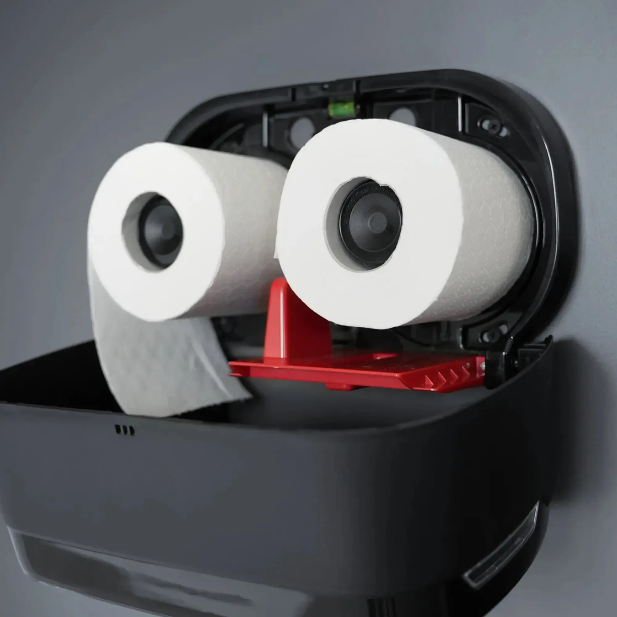 SEMYtop Toilettenpapierspender für 2 Rollen aus Kunststoff, geöffnet mit zwei eingelegten WC-Kleinrollen und rotem Halter für Unternehmen, Gastronomie und öffentliche Sanitärbereiche